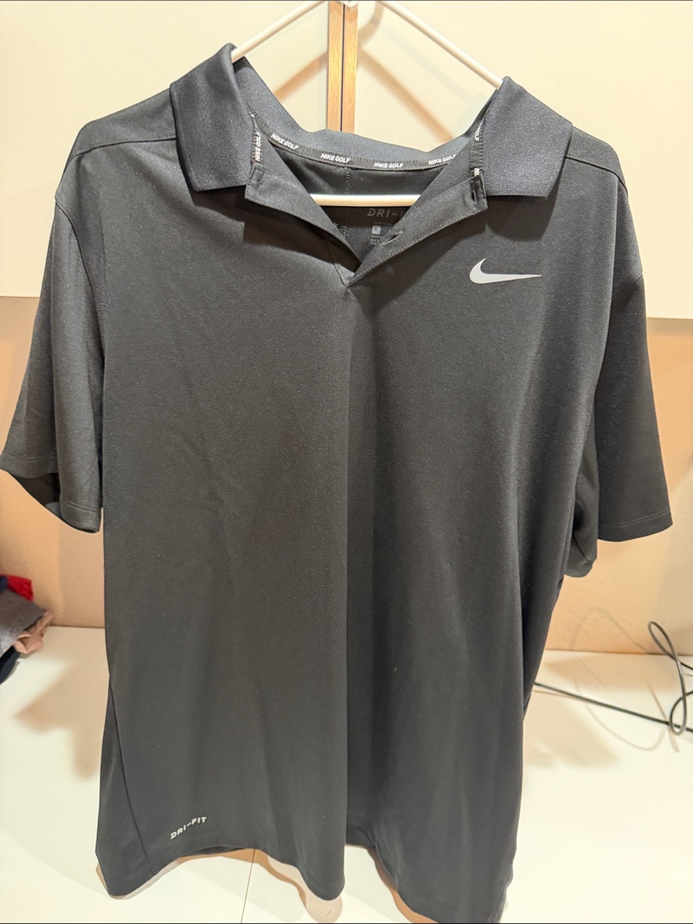 Nike Black Dri-FIT Polo with Silver Swoosh